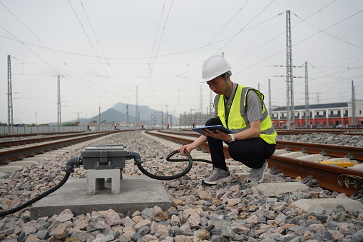 Engineers work on tablets