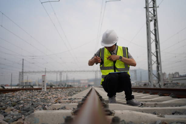 istock Young railway workers are inspecting the tracks 1492078351