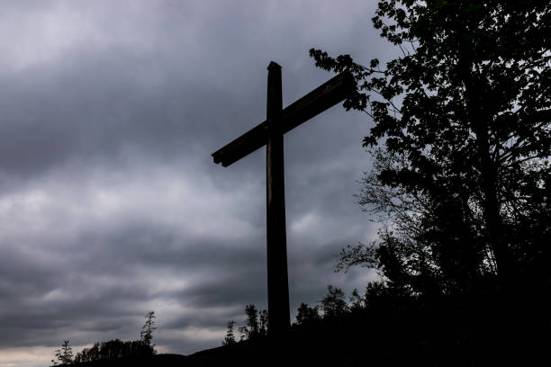 istock an cross in evening nature 1492078735
