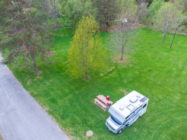 istock Aerial view of man besides motorhome 1492080302