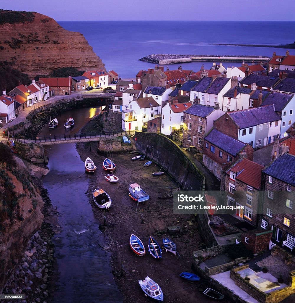 Staithes, North Yorkshire The tiny fishing village of Staithes, on the coast of North Yorkshire, UK, in evening light England Stock Photo