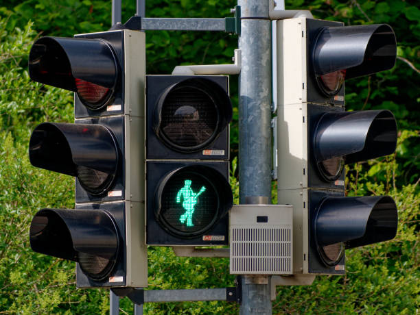 Bad Nauheim, Germany - Traffic light for pedestrians with Elvis Presley silhouette in pose with guitar. Presley was living in Bad Nauheim where he was a soldier in the nearby Friedberg from 1958 to 1960.