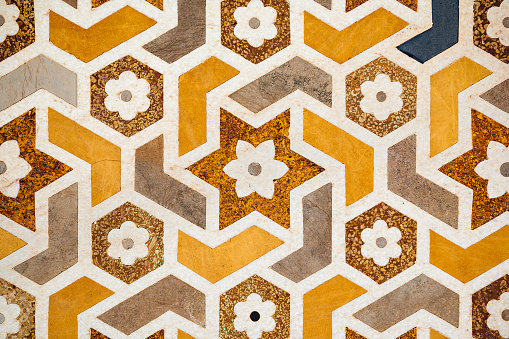 Geometric pattern background on the wall of Taj Mahal palace in Agra city, Uttar Pradesh state of India