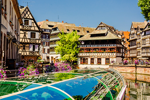 Outdoor scene with the canal and old architecture from the city of Strasbourg France
