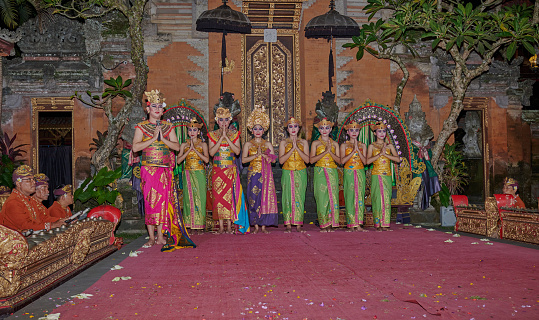 Legong , Balinese dance. It is a refined dance form characterized by intricate finger movements, complicated footwork, and expressive gestures and facial expressions