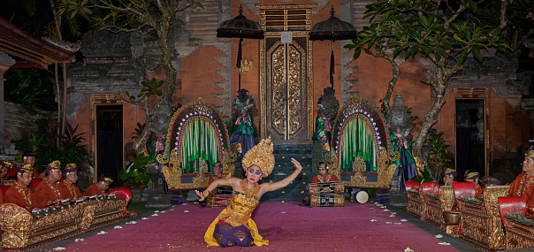 Legong , Balinese dance. It is a refined dance form characterized by intricate finger movements, complicated footwork, and expressive gestures and facial expressions