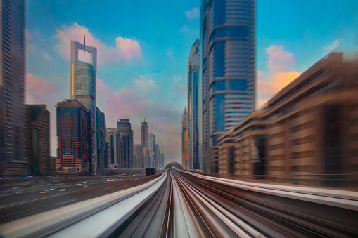 Modern skyscrapers along the metro line in Dubai, UAE