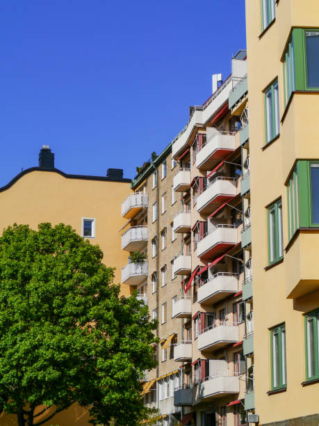 istock Low angle view of buildings against blue sky 1492112396
