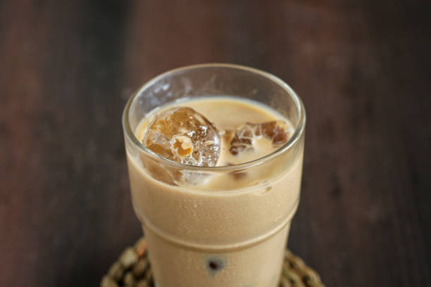 istock Iced coffee latte on a wooden table. 1492112443