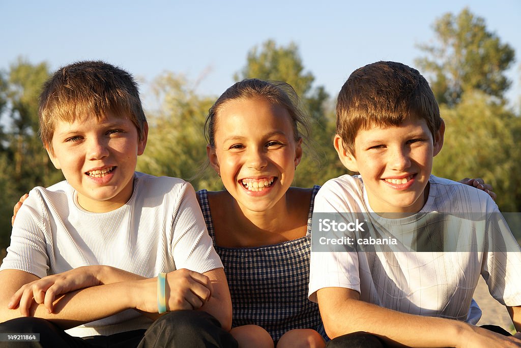 Tres amigos felices preteen - Foto de stock de 10-11 años libre de derechos