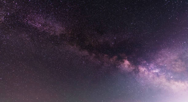 istock Beautiful starry night. Bright Milky Way galaxy sky. Astronomical background. 1492119451