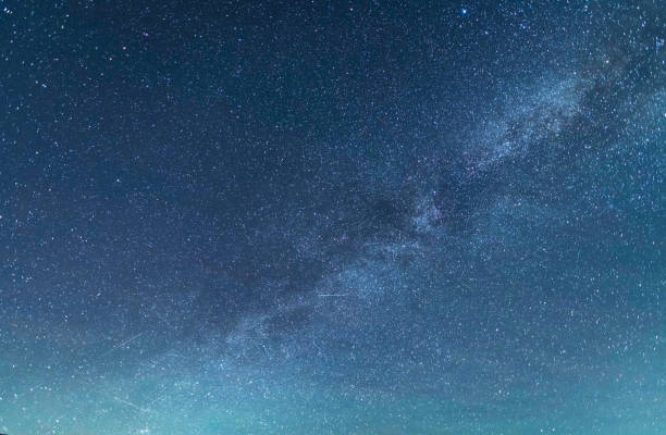 istock Beautiful starry night. Bright Milky Way galaxy sky. Astronomical background. 1492119467