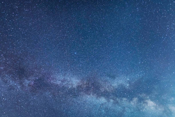istock Beautiful starry night. Bright Milky Way galaxy sky. Astronomical background. 1492119512