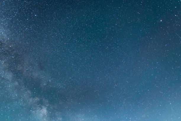 istock Beautiful starry night. Bright Milky Way galaxy sky. Astronomical background. 1492119537