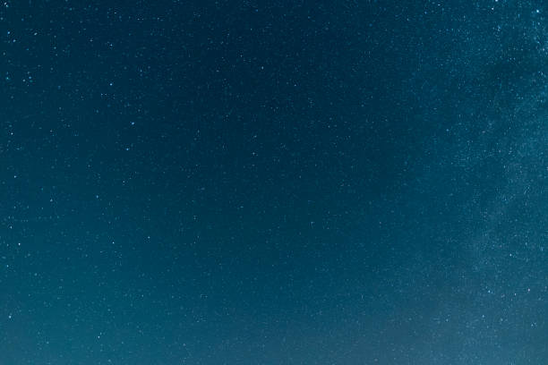 istock Beautiful starry night. Bright Milky Way galaxy sky. Astronomical background. 1492119659