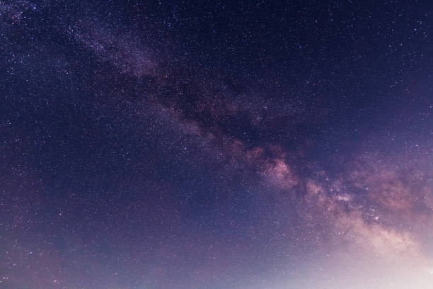 istock Beautiful starry night. Bright Milky Way galaxy sky. Astronomical background. 1492119668