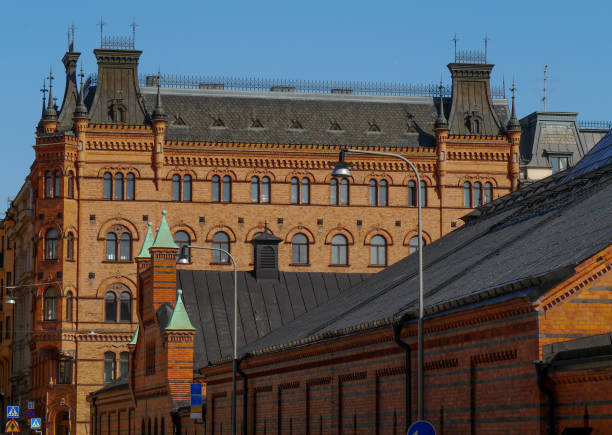 istock Low angle view of buildings against clear sky 1492119728
