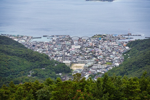 Kagoshima, Japan - May 17, 2023: Koniya Fishing Port facing Oshima strait in Amami Oshima, Japan