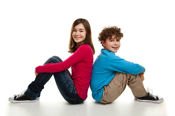 istock Girl and boy sitting 149214809
