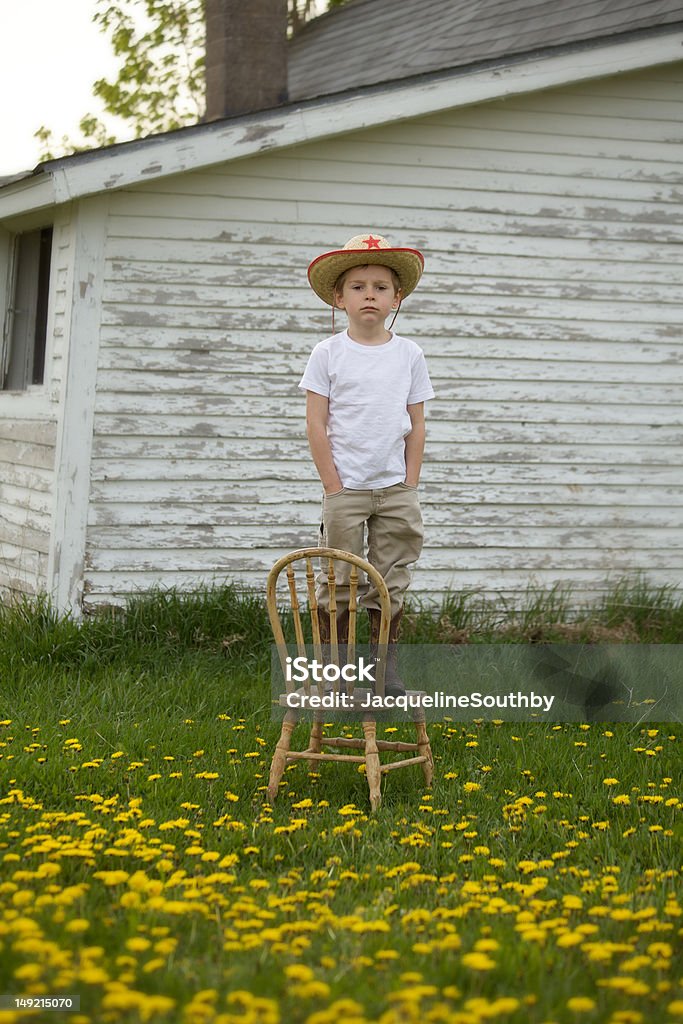 Vêtements garçon dans un Chapeau de cow-Boy - Photo de Enfant libre de droits