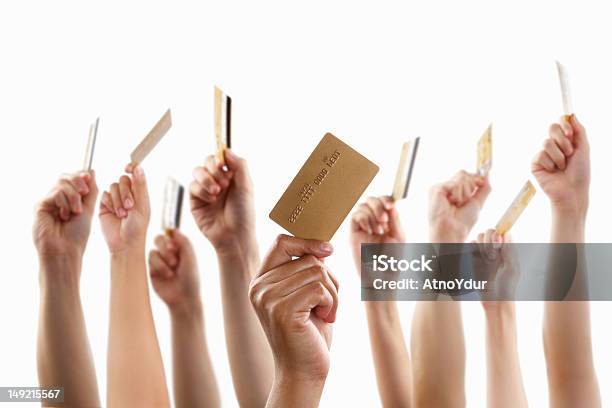 Lot Of Hands Holding Gold Credit Card Stock Photo - Download Image Now - Credit Card, Holding, Cut Out