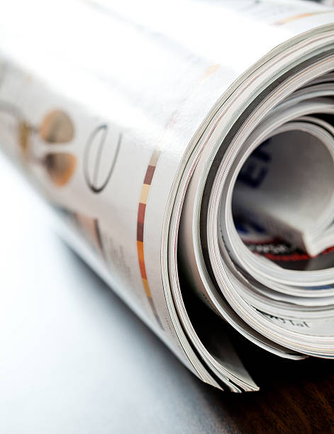 istock Stack of open colorful magazines - close-up 149215692