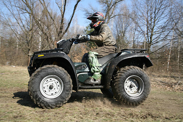 istock The man goes on ATV 149215815