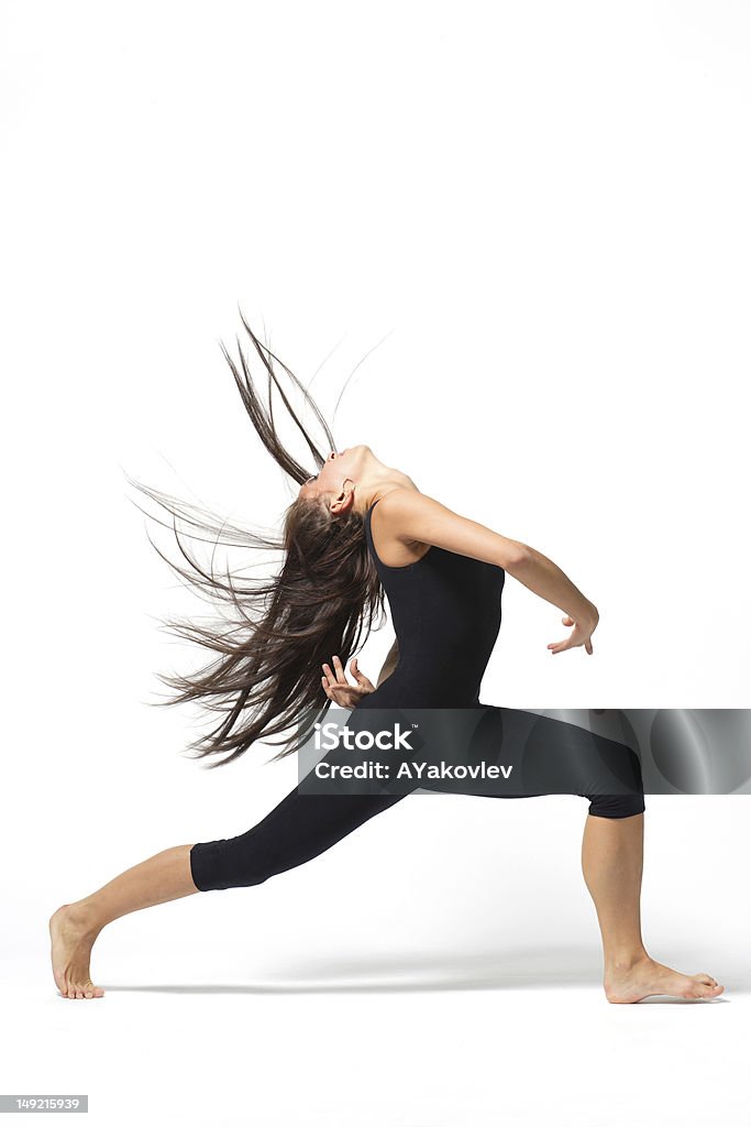 the dancer modern style dancer posing on studio background Jazz Dancing Stock Photo