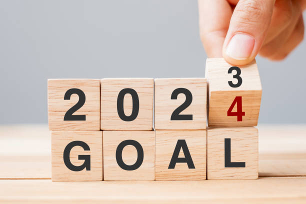istock hand flipping block 2023 to 2024 GOAL text on table. Resolution, strategy, plan, motivation, reboot, business and New Year holiday concepts 1492161931