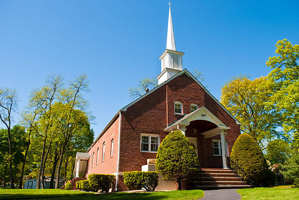 community church a local church building with a steeple brick house isolated stock pictures, royalty-free photos & images