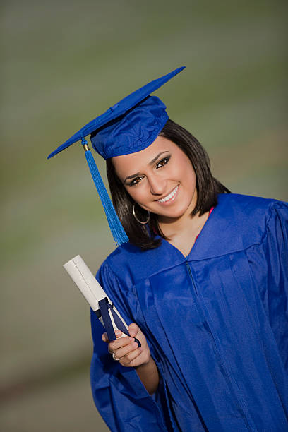 istock Female Graduate Wearing Cap and Gown 149216645