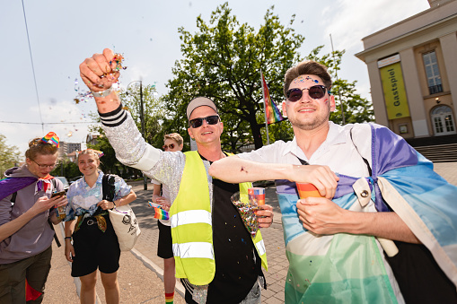Dessau, Saxony-Anhalt, Germany, Europe - 20 May 2023: LGBTQ+ celebration in Dessau, Germany. CSD - Christopher Street Day. Gay pride event 2023, people with gender symbols walking in the town.
