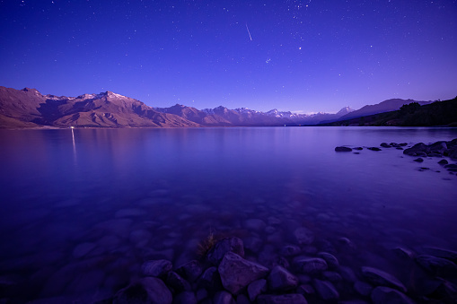 Beautiful night at Lake Pukaki looking at Southern Alps with the view of Mt Cook in backdrop, South Island, New Zealand.