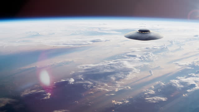 UFO saucer hovered over the planet Earth