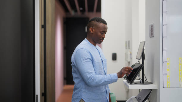 Black ethnic businessman arriving at office