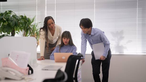 istock Group of multi-ethnic business people working together in office 1492179350