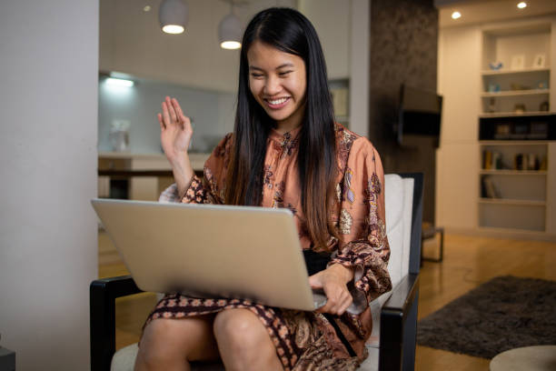 istock Young fashionable woman working at home 1492181421