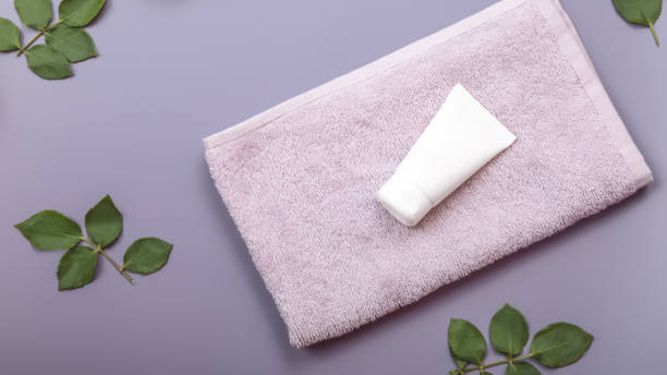 istock Top view blank white mock-up of cosmetics spa cream bottles 1492195470