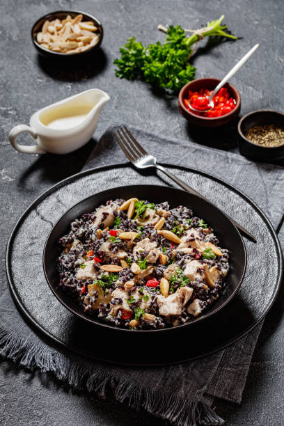 istock black rice with cream, chicken, mushrooms, almonds 1492196660