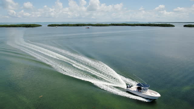 Boat moving fast in Isla Morada, Florida keys