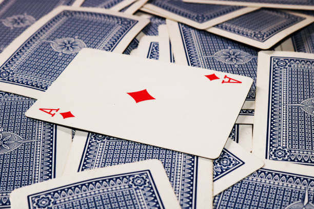istock The ace of diamonds closeup playing cards image background 1492199922
