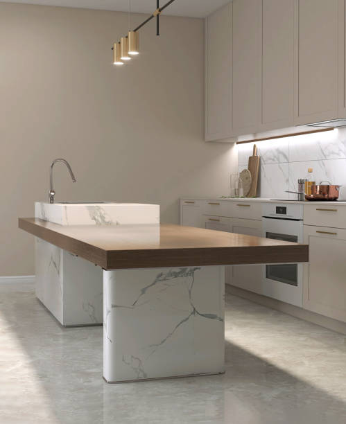 istock Modern wood dining table, marble island, sink, pendant light in beige kitchen counter, splash back, cabinet, cupboard on polished cement floor 1492202113