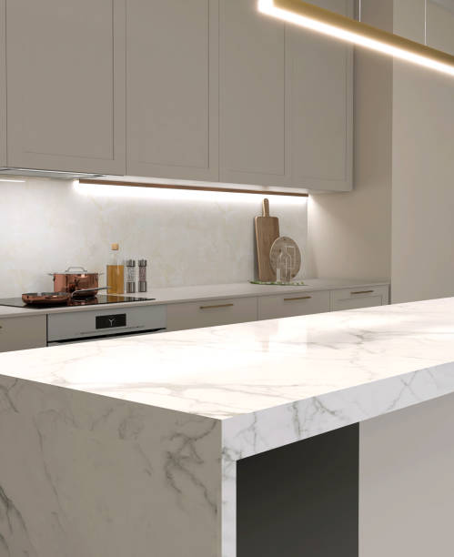 istock Modern white marble top dining table island, pendant light in luxury beige kitchen counter, hidden light, splash back, cabinet counter, cupboard 1492202236
