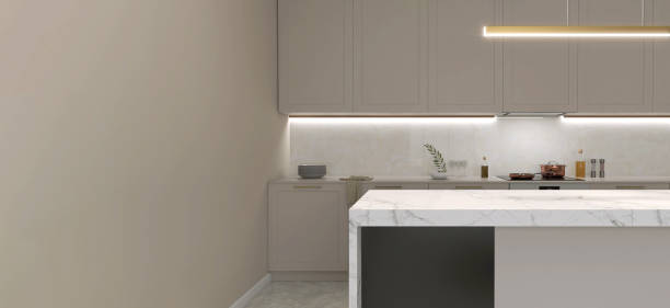 istock Modern white marble top dining table island, pendant light in luxury beige kitchen counter, hidden light, splash back, cabinet counter, cupboard 1492202237