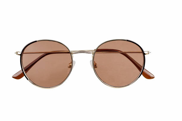 istock Round brown sunglasses, golden metallic frame 1492202342