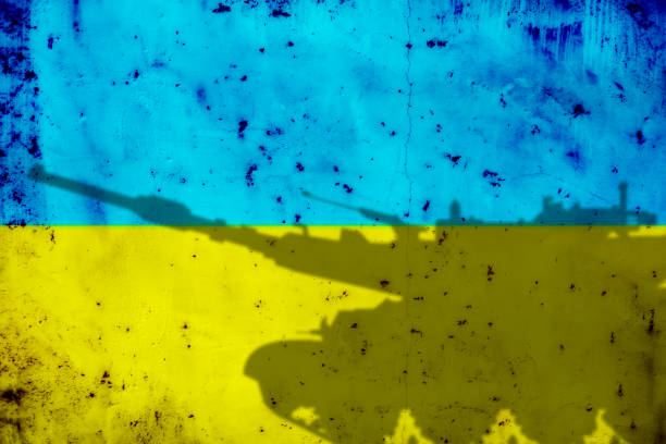 istock Ukrainian flag colors and tank shadow 1492208866