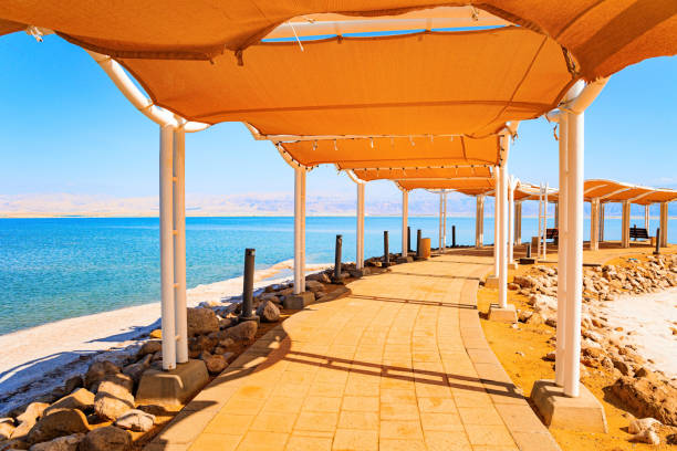 Long covered gallery on the beach stock photo