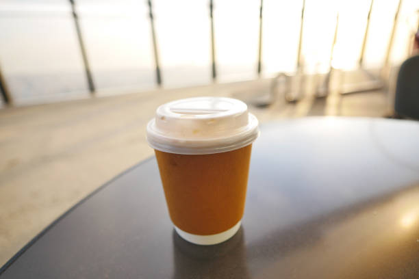 istock take away paper coffee cup o on cafe table 1492211833