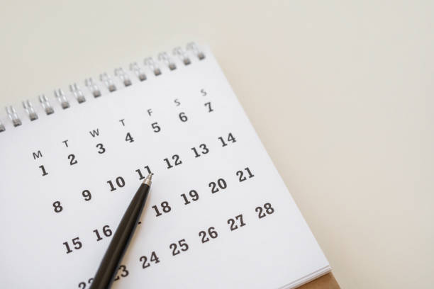 istock Calendar with pen on desk using as reminder 1492214720