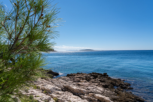 Idyllic turquoise rocky beach landscape view in Zadar riviera, Pakostane in Dalmatia region of Croatia